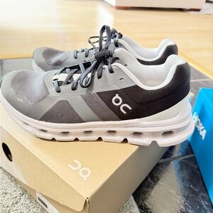 On Running Gray and Black Athletic Shoes with Cloud Cushioning